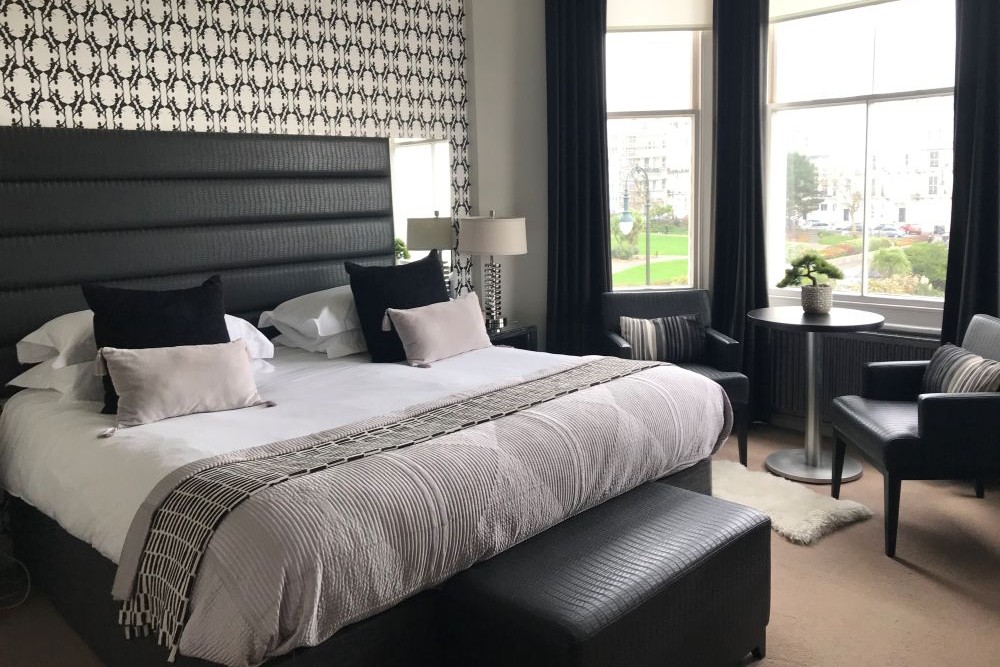 Hastings House Bedroom 5 — monochrome, sea views