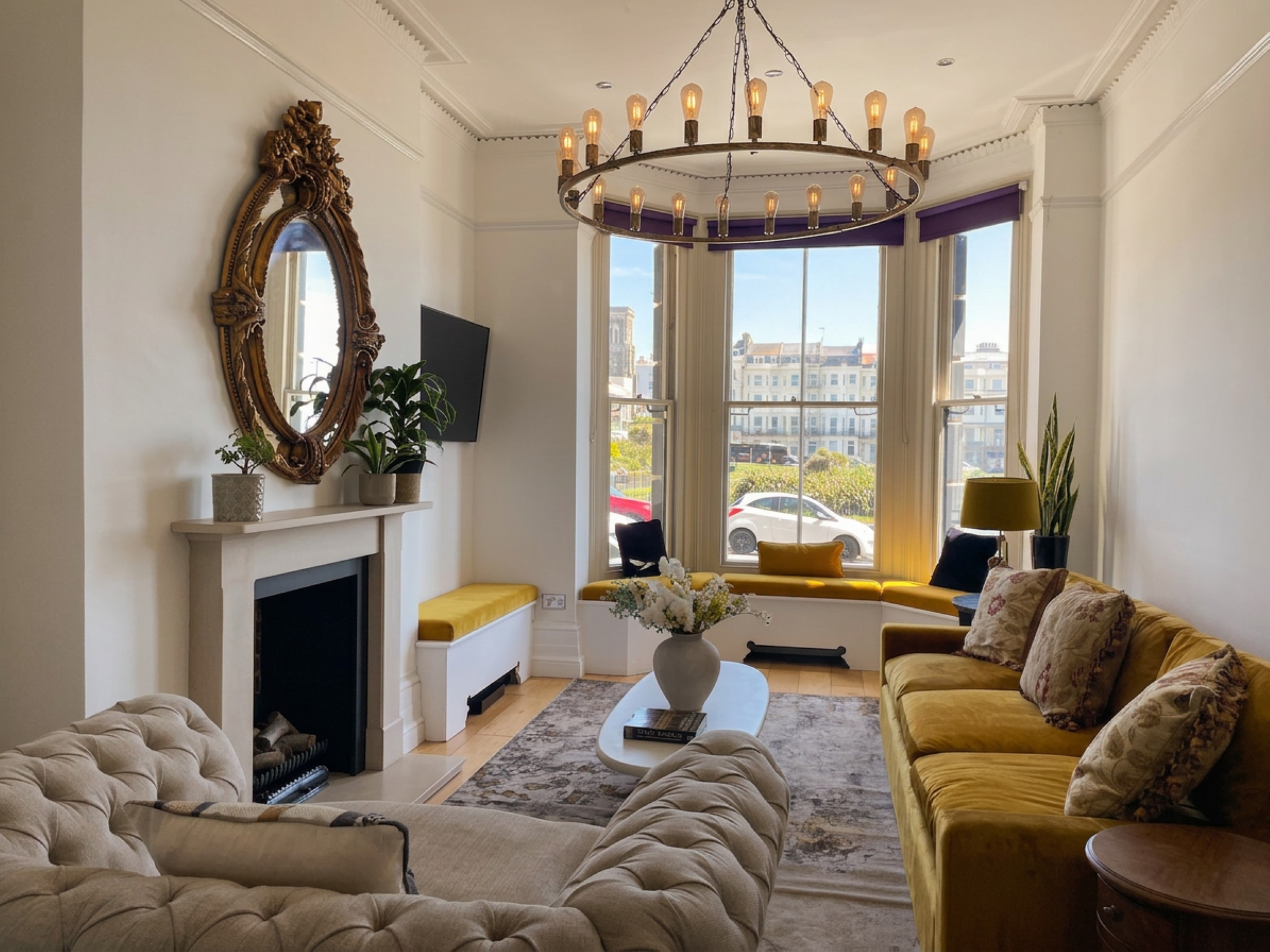 Hastings House lounge with chandelier and velvet sofas — luxury large group holiday house St Leonards-on-Sea